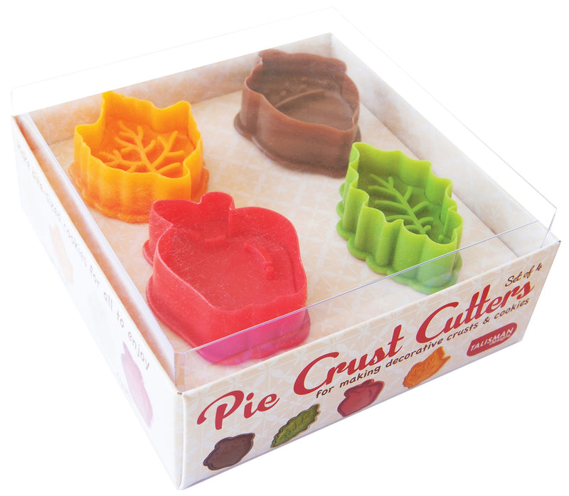 Set of four pie crust cutters in a box with colorful designs.
